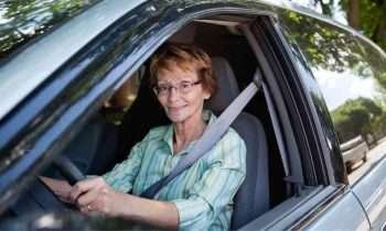 an older woman driving