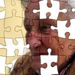 puzzle of an old man's face with missing pieces