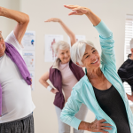 Senior Fitness: SilverSneakers Eligibility Criteria seniors at exercise class