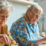 senior women with dementia working on crafts