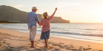 Senior couple at the beach on a short vacation trip.