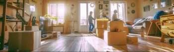 adult brother and sister cleaning out elderly parents' home